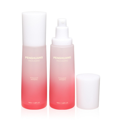 丸型の化粧品のびんはHyaluronic酸ガラスSkincareを置いた