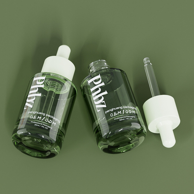 OEM 30ML 1ozの贅沢なガラス点滴器の濃緑色の血清のびん