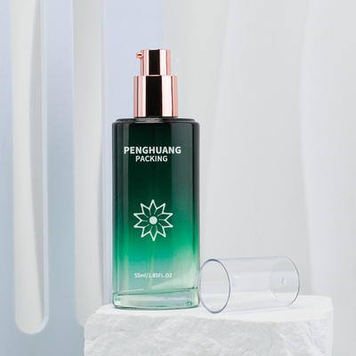 55ml美ガラスのローションのびんは化粧品のびんのギフトがSkincareの包装の緑を置いたローションを曇らした