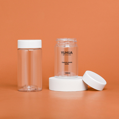 白い帽子空ペット プラスチックびんが付いている円柱プラスチックびんペット材料