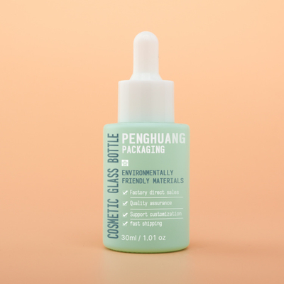 FDAのガラス化粧品の包装の一定の点滴器ポンプは吹き付け塗装の緑色20ml 50ml 100mlを