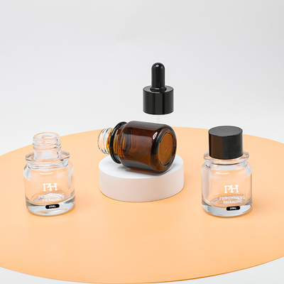スキン ケア オイルの包装のガラス点滴器の帽子のびん小型こはく色色はカスタマイズした