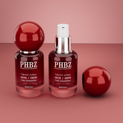 30ml / 1oz 空の赤グラデーションガラス製コスメティックセラムボトル（丸型ボールキャップ付き）、ローション・エッセンシャルオイル用カスタムカラーOEM ODMスキンケアパッケージ