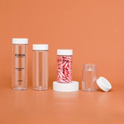 白い帽子空ペット プラスチックびんが付いている円柱プラスチックびんペット材料