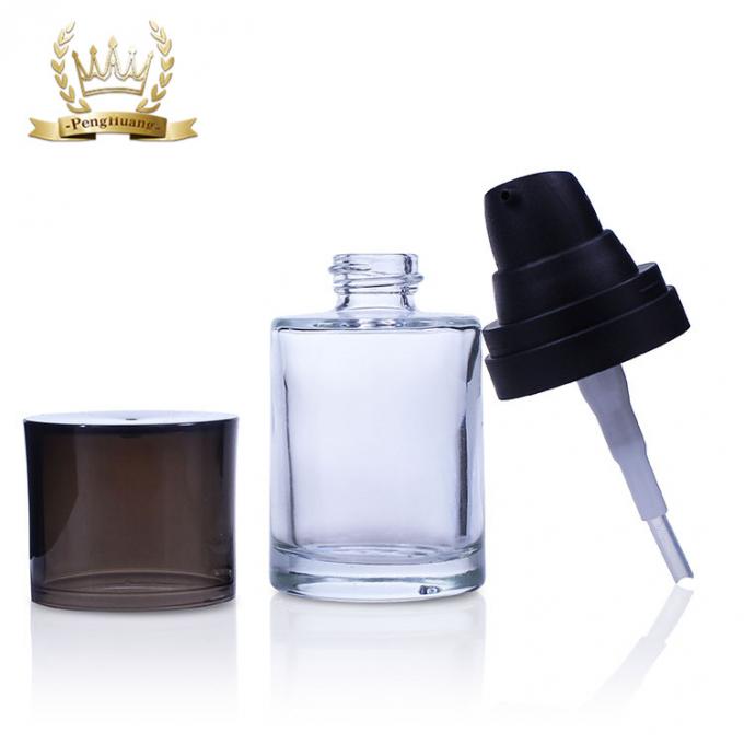 良質の明確なガラスのポンプを搭載する化粧品の包装30ml表面基礎びん