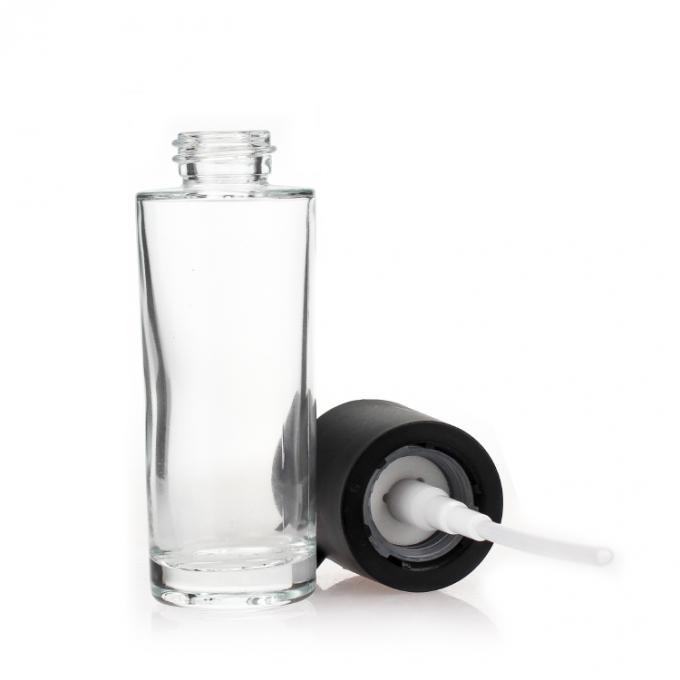 ポンプを搭載する卸し売り注文30ml特別なポンプ化粧品の液体の基礎びんのローションのびんの化粧品のガラス ビン