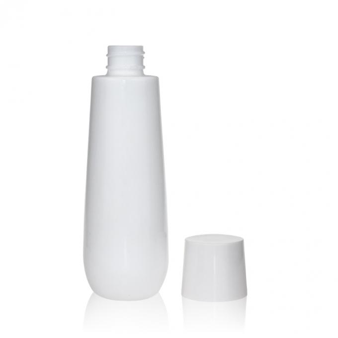 空のガラス ローションのびんを包む楕円形のミルクの白い磁器Skincare