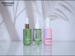 印刷されたガラス1oz豪華な血清の点滴器は化粧品の包装のためにびん詰めにする